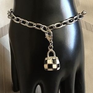 Metal bracelet with black/white purse charm, can be removed